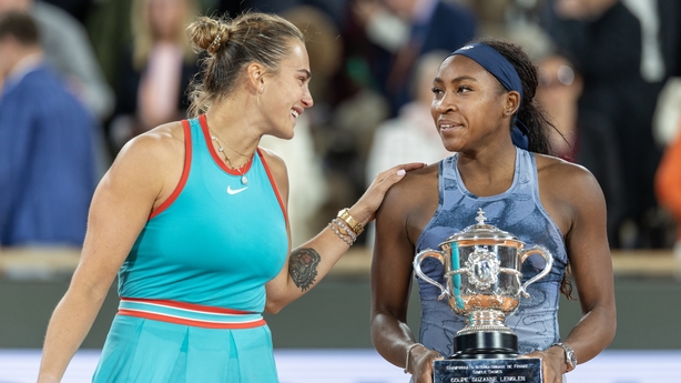 Coco Gauff of the United States with the winners' trophy and Aryna Sabalenka with the runners-up trophy at the trophy presentations after the Women's Singles Final on Court Philippe-Chatrier during the 2025 French Open Tennis Tournament at Roland Garros on June 7th, 2025, in Paris, France.