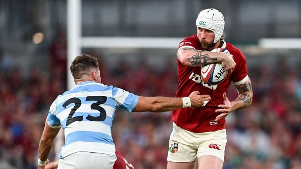 20 June 2025; Mack Hansen of British & Irish Lions is tackled by Santiago Cordero of Argentina during the Lions 1888 Cup match between the British & Irish Lions and Argentina at the Aviva Stadium in Dublin. Photo by Ramsey Cardy/Sportsfile