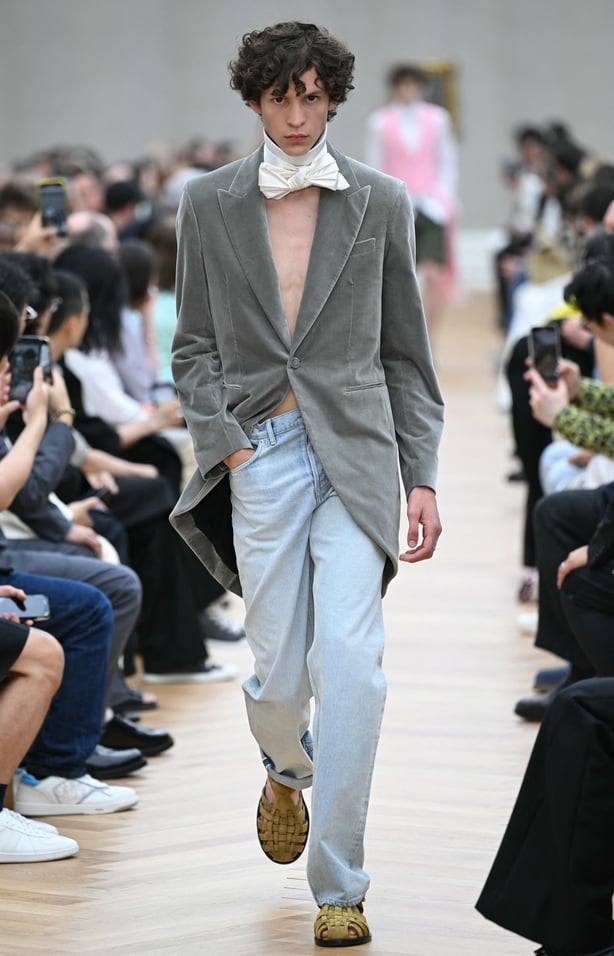 a person walking down a runway