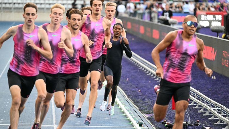 Cathal Doyle (L) was one of 13 pacemakers to assist Faith Kipyegon in her 'Breaking4' project on Thursday evening