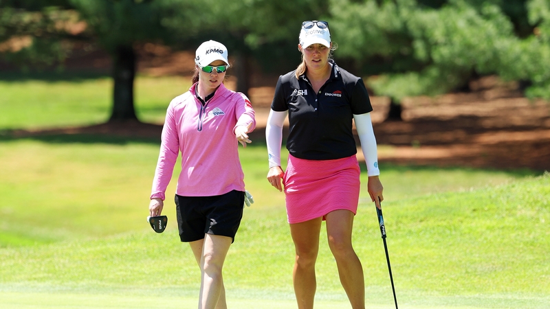 Leona Maguire (L) and Jennifer Kupcho of the United States look on from the fifth holeat the Midland Country Club