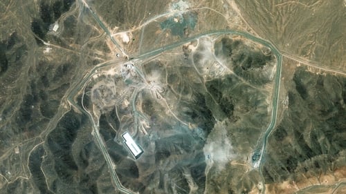 Maxar satellite imagery provides a wide overview of the Fordow nuclear complex in Iran, which was bombed by the US