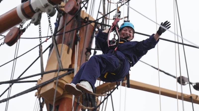 Lorraine Kelly abseils from the mast of the RRS Discovery at Discovery Point in Dundee to celebrate the announcement of an all-new experience opening to public at Discovery Point in late 2025. Photo credit: Andrew Milligan/PA Wire