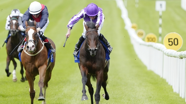 KILDARE, IRELAND - JUNE 28: Ryan Moore riding Beautify (R, purple) win The Airlie Stud Stakes at Curragh Racecourse on June 28, 2025 in Kildare, Ireland. (Photo by Alan Crowhurst/Getty Images)