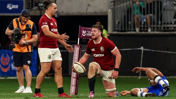28 June 2025; Joe McCarthy of British & Irish Lions, right, celebrates with teammate James Lowe after scoring their side's sixth try during the tour match between Western Force and the British & Irish Lions at Optus Stadium in Perth, Australia. Photo by Steve Christo/Sportsfile