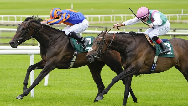 KILDARE, IRELAND - JUNE 28: Ryan Moore riding Whirl (L) win The Paddy Power Pretty Polly Stakes from Colin Keane and Kalpana (R) at Curragh Racecourse on June 28, 2025 in Kildare, Ireland. (Photo by Alan Crowhurst/Getty Images)