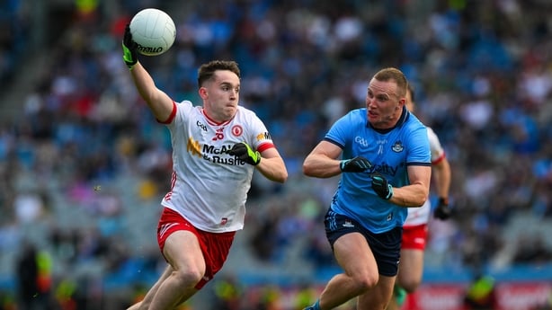 28 June 2025; Eoin McElholm of Tyrone in action against Ciarán Kilkenny of Dublin during the GAA Football All-Ireland Senior Championship quarter-final match between Dublin and Tyrone at Croke Park in Dublin. Photo by Ray McManus/Sportsfile