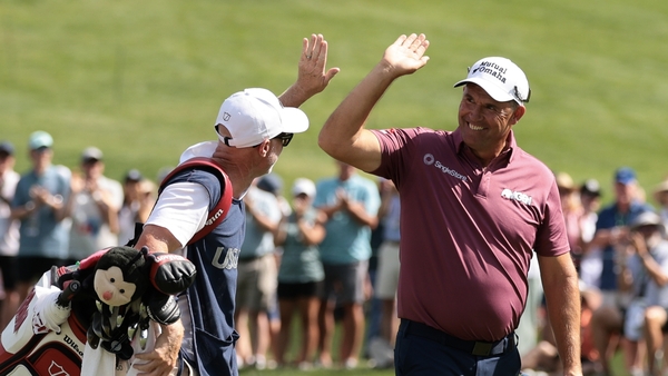 COLORADO SPRINGS, COLORADO - JUNE 28: Padraig Harrington of Ireland and his caddie Ronan Flood celebrate after chipping in for a birdie on the 18th green during the third round of the U.S. Senior Open Championship 2025 at Broadmoor Golf Club on June 28, 2