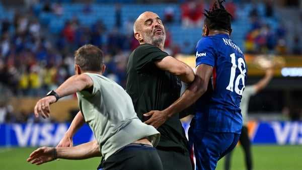 Christopher Nkunku #18 of Chelsea FC celebrates scoring his team's second goal with Enzo Maresca, Head Coach of Chelsea FC, during the FIFA Club World Cup 2025 round of 16 match between SL Benfica and Chelsea FC at Bank of America Stadium on June 28, 2025
