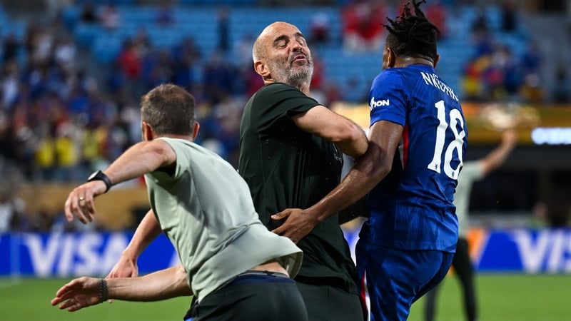 Enzo Maresca celebrates with Christopher Nkunku after the latter scored Chelsea's second goal