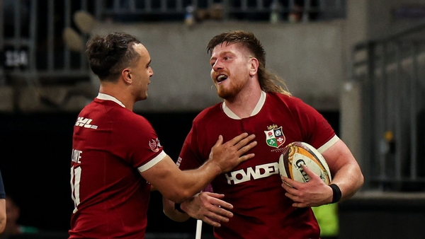 28 June 2025; Joe McCarthy of British & Irish Lions, right, celebrates with teammate James Lowe after scoring their side's sixth try during the tour match between Western Force and the British & Irish Lions at Optus Stadium in Perth, Australia. Photo by S