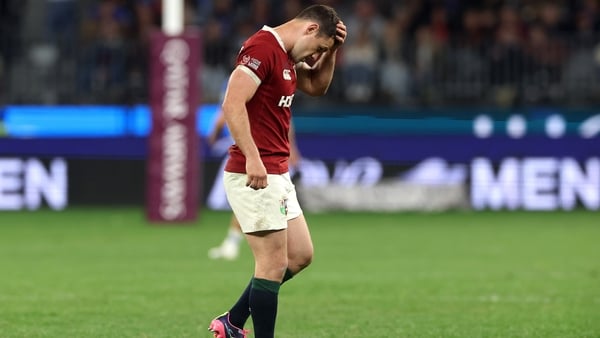 Tomos Williams of the British & Irish Lions walks off the field after an injury sustained