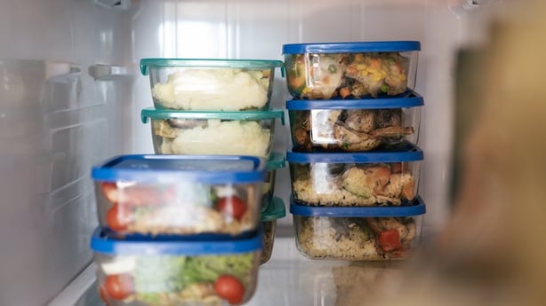 Takeaway business lunchboxes in the fridge. Food rations for the office in glass bowls. Delicious prepared food for a fitness diet. Healthy meal for a few days