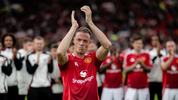 MANCHESTER, ENGLAND - MAY 25: Jonny Evans of Manchester United applauds the fans at the end of the Premier League match between Manchester United FC and Aston Villa FC at Old Trafford on May 25, 2025 in Manchester, United Kingdom. (Photo by Ash Donelon/Manchester United via Getty Images)
