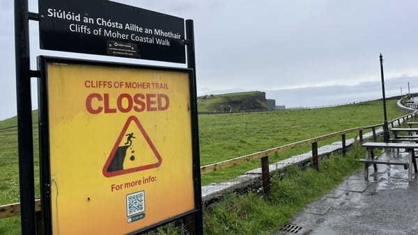 A sign warning that coastal walks were shut at the Cliffs of Moher