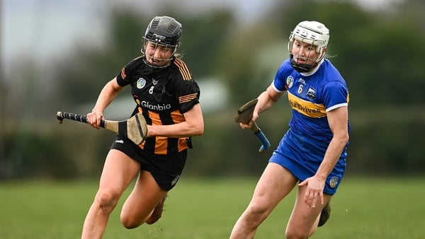 1 March 2025; Aobha O'Gorman of Kilkenny in action against Mairead Eviston of Tipperary during the Very National Camogie League Division 1A match between between Tipperary and Kilkenny at The Ragg GAA Grounds in Tipperary. Photo by Tom Beary/Sportsfile