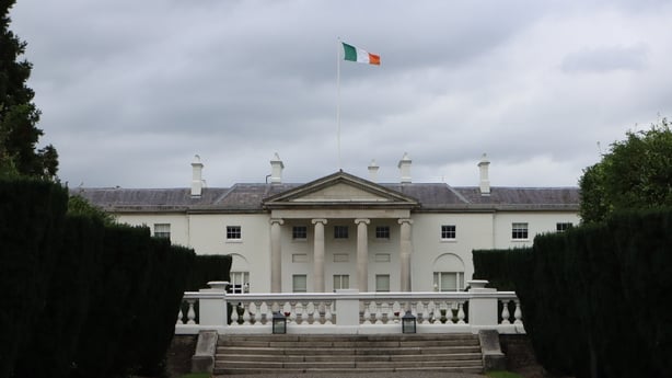 The Irish flag flies over the official residence of the president of the Republic of Ireland
