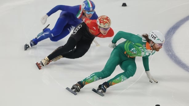  Sean McAnuff of Ireland and Liu Saoang of China competes in the Men's 1000m Quarterfinals Heats during the ISU World Short Track Speed Skating Championships on March 14, 2025 in Beijing, China.