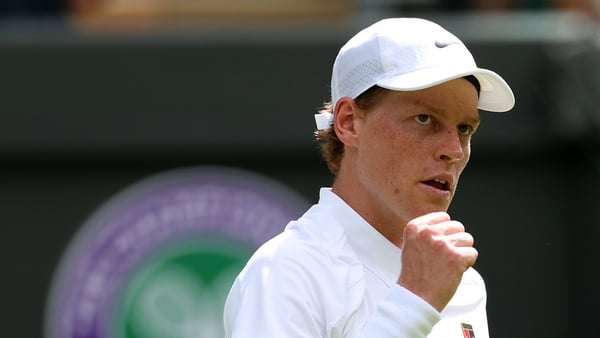 Jannik Sinner of Italy celebrates winning match point against Luca Nardi of Italy during the Gentlemen's Singles first round match on day two of The Championships Wimbledon 2025 at All England Lawn Tennis and Croquet Club on July 01, 2025 in London, Engla