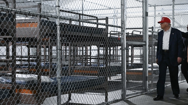 US President President Donald Trump tours a migrant detention center, dubbed "Alligator Alcatraz," located at the site of the Dade-Collier Training and Transition Airport in Ochopee, Florida on July 1, 2025. President Trump is visiting a migrant detention