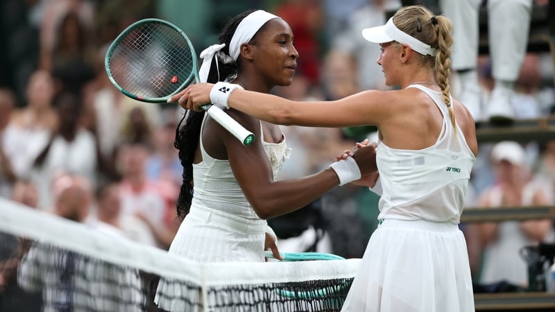 Coco Gauff (L) shakes hands with Dayana Yastremska after her surprise defeat