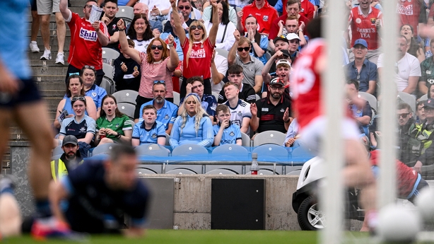 Cork supporters celebrate their side's first goal, scored by Chris Óg Jones, during the GAA Football All-Ireland Senior Championship preliminary quarter-final match between Dublin and Cork at Croke Park in Dublin.