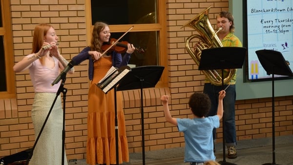 a group of people playing instruments