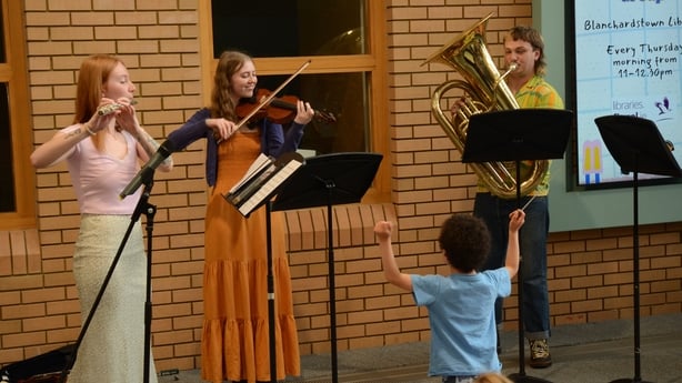 a group of people playing instruments