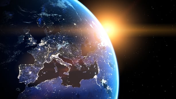 Planet Earth viewed from space with glowing city lights. Europe view. World with shine sunrise from the space. Textures furnished from public domain NASA https://visibleearth.nasa.gov/images/55167/earths-city-lights