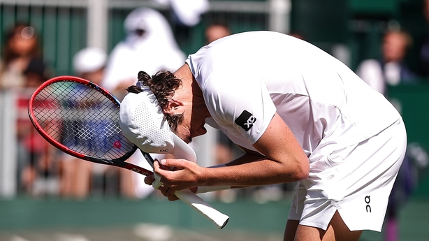 Brazil's Joao Fonseca celebrates after winning against US player Jenson Brooksby during their men's singles second round tennis match on the third day of the 2025 Wimbledon Championships at The All England Lawn Tennis and Croquet Club in Wimbledon, southwest London, on July 2, 2025.