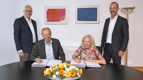 Catherine von Fürstenberg-Dussmann, Chairwoman of the Board of Dussmann Group (seated) with Sean McElligott, MD of Lynskey Engineering, Stephan Possekel, MD of Dussmann Technical Solutions (left) and Oliver Finckh, also MD of Dussmann Technical Solutions