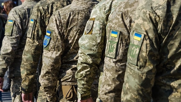 Ukrainian soldiers on military parade. Ukrainian flag on military uniform. Ukraine troops.