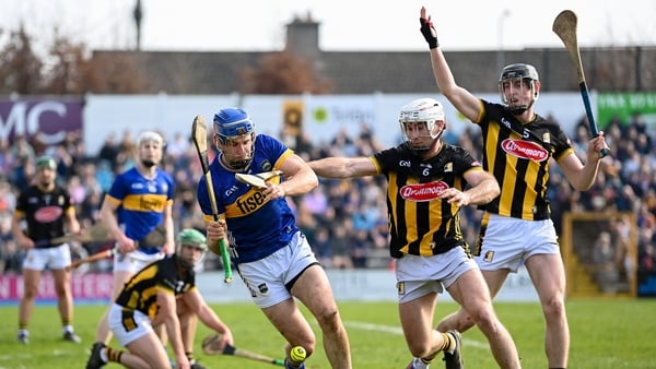 9 March 2025; John McGrath of Tipperary in action against Mikey Carey of Kilkenny during the Allianz Hurling League Division 1A match between Kilkenny and Tipperary at UPMC Nowlan Park in Kilkenny. Photo by Stephen McCarthy/Sportsfile