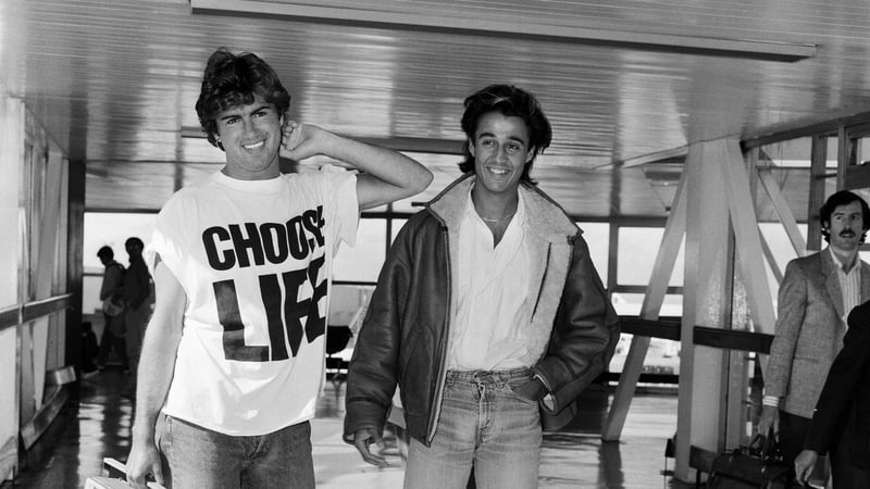 Wham's Andrew Ridgeley and George Michael at London airport in 1984 sporting a 'Choose Life' t-shirt. Photo: Victor Crawshaw/Mirrorpix/Getty Images