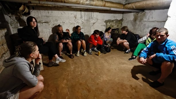 KYIV, UKRAINE - JULY 4: People take shelter in a bomb shelter during a Russian missile and drone attack on July 4, 2025 in Kyiv, Ukraine. The Russian army launched a mass strike on Ukraine, using almost 540 drones and more than 10 missiles of various types, most of which were targeted at the Ukraini