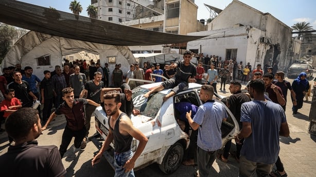 GAZA CITY, GAZA - JULY 04: Palestinians injured in Israeli attacks on Zaytoun neighborhood in eastern Gaza City are brought to Al-Ahli Baptist Hospital in Gaza City, Gaza on July 04, 2025. Since early morning, Israeli strikes on the Gaza Strip have killed 46 Palestinians, including 20 people who wer