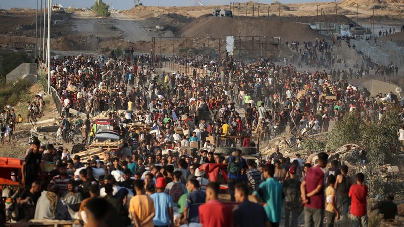 Palestinians gather at an aid distribution point set up by the privately-run Gaza Humanitarian Foundation