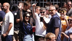 Oasis fans enjoying a drink in the Cardiff sunshine