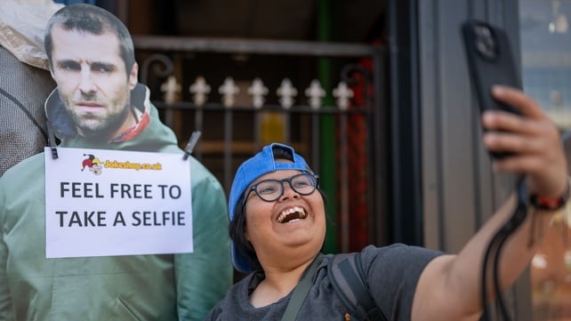 CARDIFF, WALES - JULY 4: A fan takes a selfie ahead of the opening night of the Oasis Live '25 Tour at the Principality Stadium on July 4, 2025 in Cardiff, Wales. The long-awaited Oasis reunion tour kicks off tonight in Cardiff. (Photo by Matthew Horwood/
