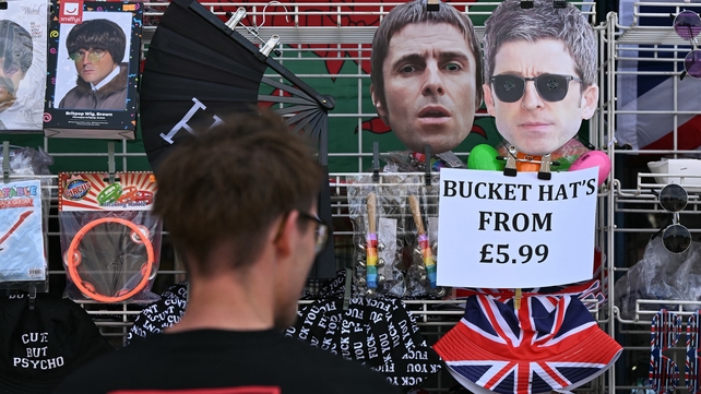 Merchandise for Oasis seen for sale in the centre of Cardiff