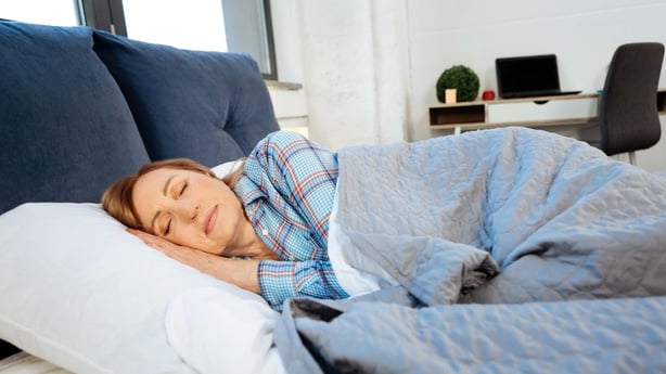 a person sleeping in bed