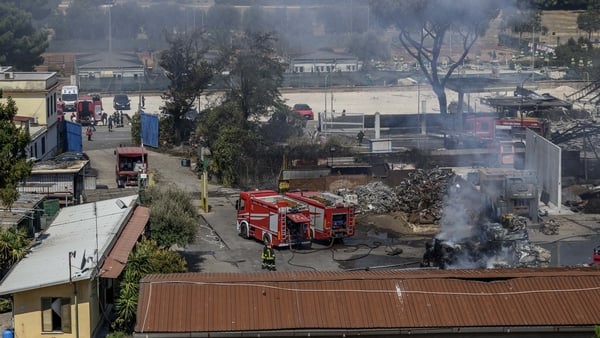 ROME, ITALY - JULY 4: Firefighters work at the site of the explosion at a petrol station in Via dei Gordiani, on July 4, 2025 in Rome, Italy. More than a dozen people have been injured, residents have been forced to flee and a summer camp was evacuated af