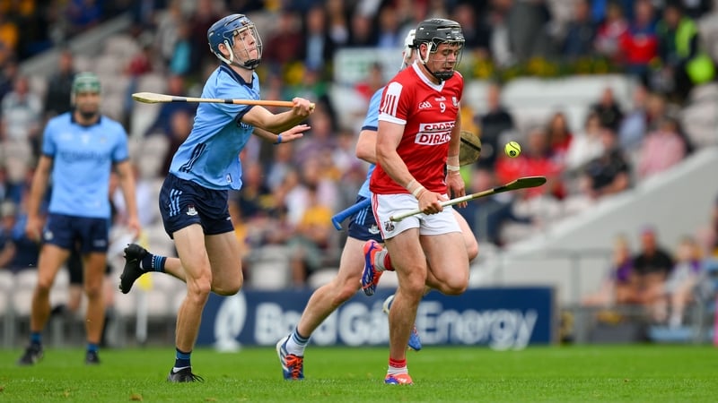 Cork's Darragh Fitzgibbon is pursued by Brian Hayes of Dublin during the 2024 All-Ireland SHC quarter-final won 0-26 to 0-21 by the Rebels