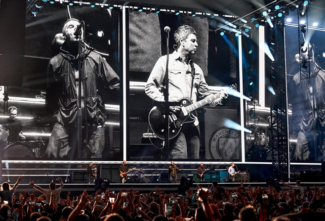 CARDIFF, WALES - JULY 04: (EDITORS NOTE: EDITORIAL USE ONLY. IMAGES MAY ONLY BE USED IN RELATION TO THE EVENT. NO COMMERCIAL USE. NO USE IN PUBLICATIONS SOLELY DEDICATED TO THE ARTIST. NO USE AFTER JULY 03, 2026.) Oasis perform on stage during the opening