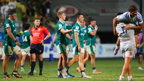 Ireland players react after the Pool C defeat to Italy