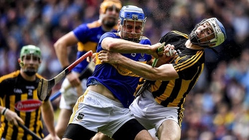 Tipperary forward John McGrath is tackled by Kilkenny defender Huw Lawlor during the 2019 All-Ireland final