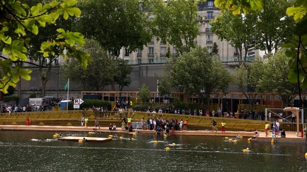 PARIS, FRANCE - JULY 5: Members of the public swim at the Baignade de Grenelle bathing site on the opening day on July 5, 2025 in Paris, France. Mayor of Paris Anne Hidalgo is visiting three bathing sites as the city launches its inaugural season of public swimming in the River Seine for the first t