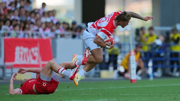 Halatoa Vailea of Japan runs with the ball during 
