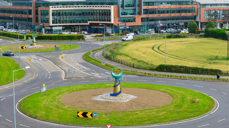 The sculptures named 'The Well of Wisdom' and 'Boann, Goddess of the Boyne' stand on the Southgate roundabouts in Colpe