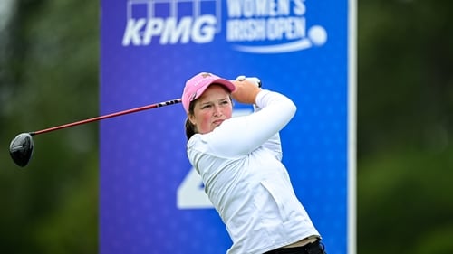 Lottie Woad watches her tee shot on the fourth hole